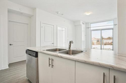 450 Dundas Street E|Unit #308, Waterdown, ON - Indoor Photo Showing Kitchen With Double Sink