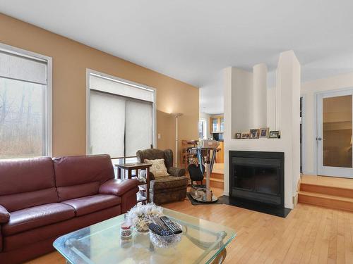 Family room - 4965 Rue Du Tremblay, Laval (Chomedey), QC - Indoor Photo Showing Living Room With Fireplace