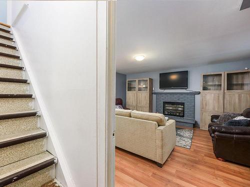 Family room - 4998  - 5000 Rue Ste-Suzanne, Montréal (Pierrefonds-Roxboro), QC - Indoor With Fireplace