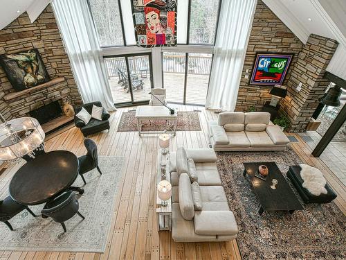 Overall view - 383 Rue De La Chasse-Galerie, Sainte-Adèle, QC - Indoor With Fireplace