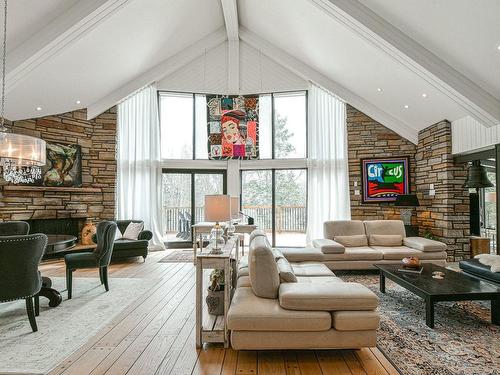Overall view - 383 Rue De La Chasse-Galerie, Sainte-Adèle, QC - Indoor Photo Showing Living Room With Fireplace