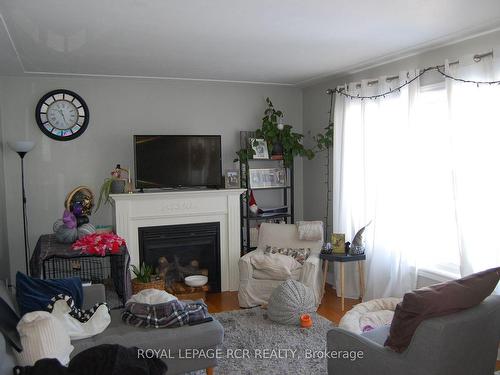 63 Olympic Dr, Kitchener, ON - Indoor Photo Showing Living Room With Fireplace