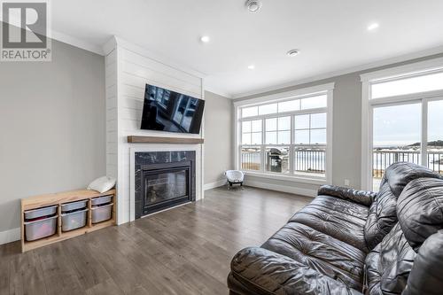 56 Lance Cove Road, Conception Bay South, NL - Indoor Photo Showing Living Room With Fireplace
