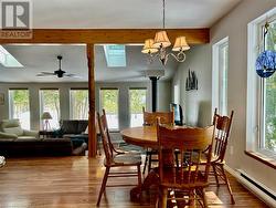 Dining area overlooks the Great Room for easy entertaining. - 