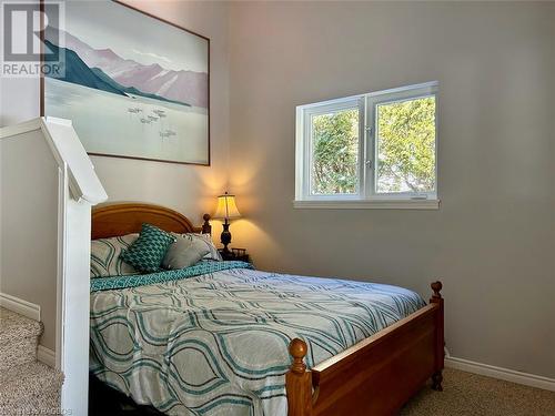 Multiple windows and waterviews! - 41 Water Street, South Bruce Peninsula, ON - Indoor Photo Showing Bedroom