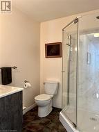 Recently redesigned bathroom with glass shower. - 