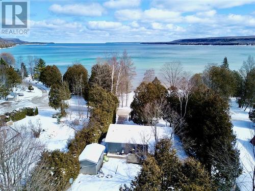 Now let's explore the abundant natural features outside this near-waterfront property. - 41 Water Street, South Bruce Peninsula, ON - Outdoor With Body Of Water With View
