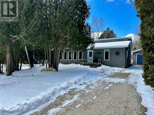 Property is well set back from the quiet road and has excellent cedar and spruce tree coverage for year-round privacy. - 41 Water Street, South Bruce Peninsula, ON - Outdoor