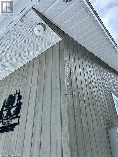 Quality exterior finishes include natural wood siding with solid stain for protection. Maintenance-free aluminum soffit and fascia. - 41 Water Street, South Bruce Peninsula, ON - Outdoor