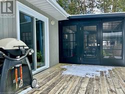 Access to decking from both patio door and new (2022) sunroom area. - 