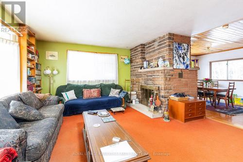19 Bessie Ave N, Kawartha Lakes, ON - Indoor Photo Showing Living Room With Fireplace