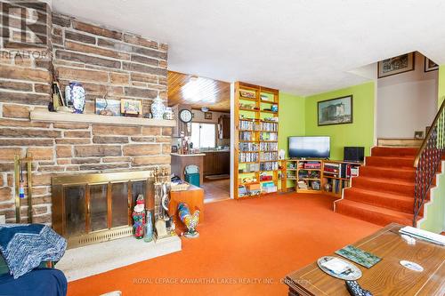 19 Bessie Avenue N, Kawartha Lakes, ON - Indoor With Fireplace