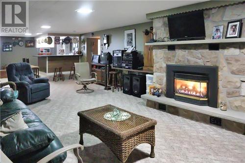 881 Olivier Street, Verner, ON - Indoor Photo Showing Living Room With Fireplace