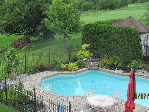 Pool - 133 Rue Des Français, Mont-Saint-Hilaire, QC - Outdoor With In Ground Pool With Backyard