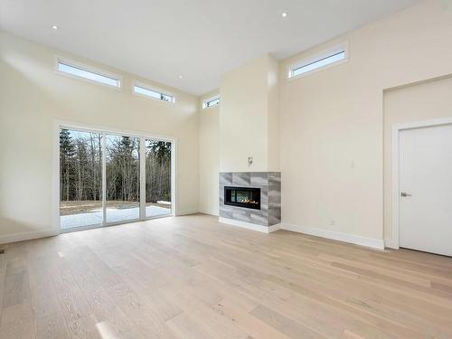 4656 Galdwell Rd, Cowichan Bay, BC - Indoor Photo Showing Other Room With Fireplace