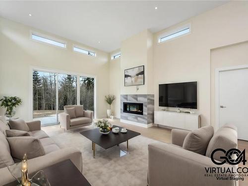 4656 Galdwell Rd, Cowichan Bay, BC - Indoor Photo Showing Living Room With Fireplace