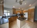 5229 Hallmark Crescent, Fort Nelson, BC  - Indoor Photo Showing Kitchen With Double Sink 