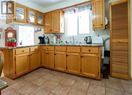 6 Pine Street N, Ingleside, ON - Indoor Photo Showing Kitchen With Double Sink