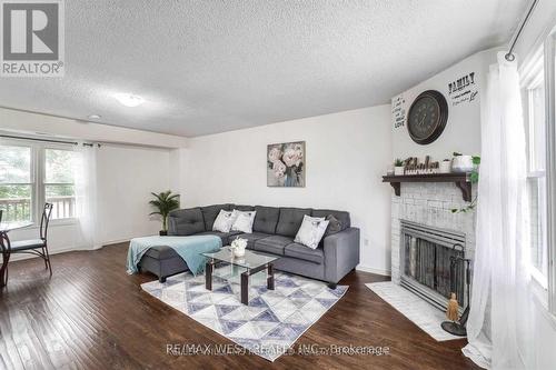 3 - 119 D'Ambrosio Drive, Barrie, ON - Indoor Photo Showing Living Room With Fireplace