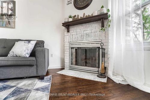 3 - 119 D'Ambrosio Drive, Barrie, ON - Indoor Photo Showing Living Room With Fireplace