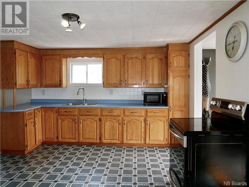 13 Riverside Drive, St. Stephen, NB - Indoor Photo Showing Kitchen With Double Sink