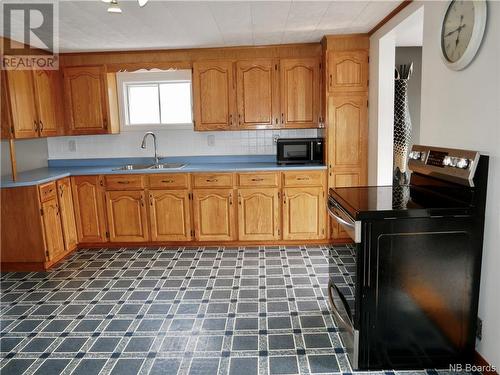 13 Riverside Drive, St. Stephen, NB - Indoor Photo Showing Kitchen With Double Sink