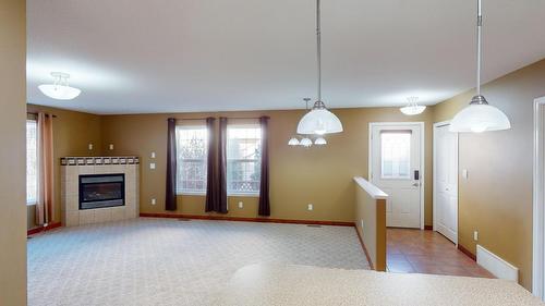 A - 2504 Kootenay Place, Cranbrook, BC - Indoor With Fireplace