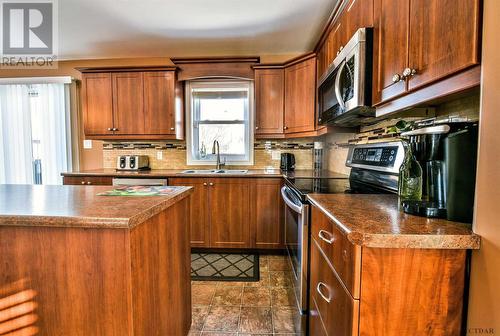 56 Jv Bonhomme Blvd, Timmins, ON - Indoor Photo Showing Kitchen With Double Sink