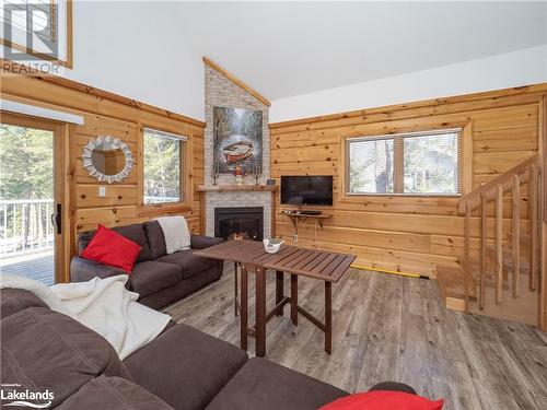 110 Cedar Shores Pvt, Bracebridge, ON - Indoor Photo Showing Living Room With Fireplace