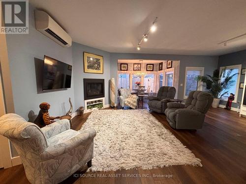 #17 -2380 9Th Ave E, Owen Sound, ON - Indoor Photo Showing Living Room With Fireplace