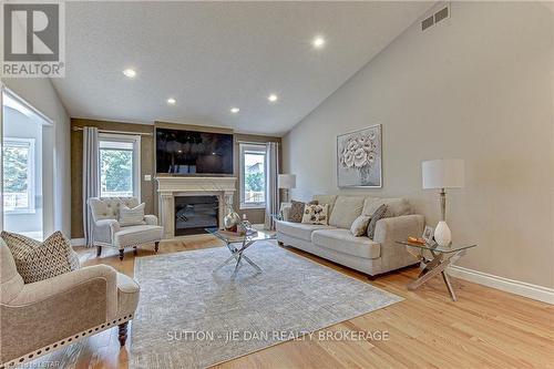 2025 Ashgrove Crt, London, ON - Indoor Photo Showing Living Room With Fireplace