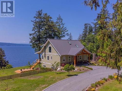 8447 Highway 101, Powell River, BC - Outdoor With Body Of Water With Facade