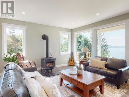 8447 Highway 101, Powell River, BC - Indoor Photo Showing Living Room With Fireplace