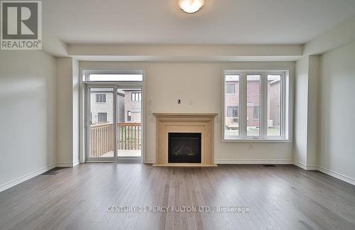 25 Bromfield Street, Whitby, ON - Indoor Photo Showing Living Room With Fireplace
