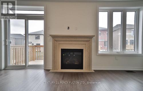 25 Bromfield St, Whitby, ON - Indoor Photo Showing Living Room With Fireplace
