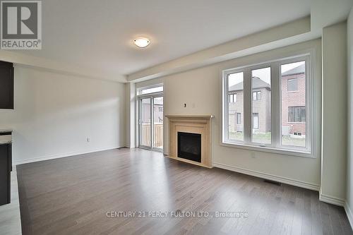 25 Bromfield St, Whitby, ON - Indoor Photo Showing Living Room With Fireplace