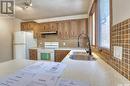 117 2Nd Street W, Pierceland, SK  - Indoor Photo Showing Kitchen With Double Sink 