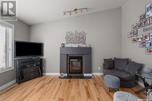 11 Linner Lane, Prince Albert, SK - Indoor Photo Showing Living Room With Fireplace