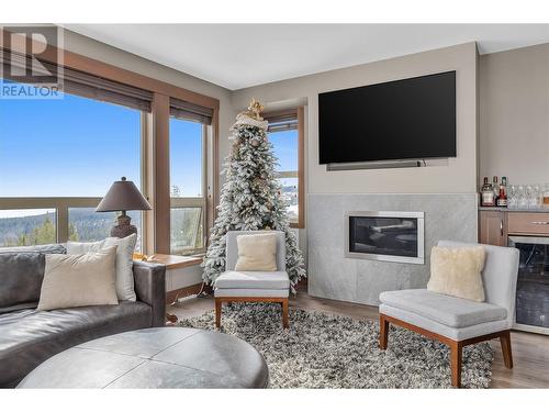 375 Raven Ridge Road Unit# 301B, Big White, BC - Indoor Photo Showing Living Room With Fireplace