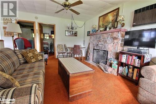 1030 Nectarine Lane, Minden Hills, ON - Indoor Photo Showing Living Room With Fireplace