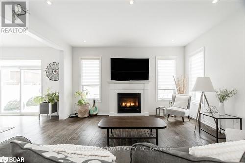 9 Copeland Crescent, Innisfil, ON - Indoor Photo Showing Living Room With Fireplace