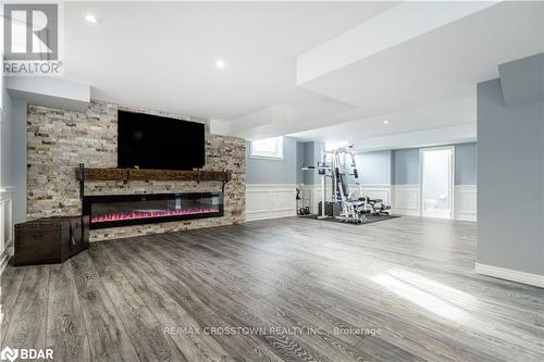 9 Copeland Cres, Innisfil, ON - Indoor Photo Showing Other Room With Fireplace