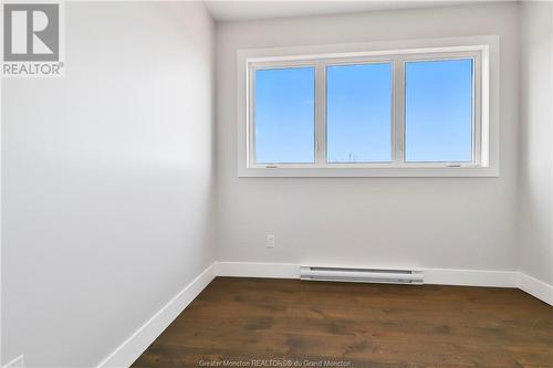 280 Comeau Point Rd, Shemogue, NB - Indoor Photo Showing Living Room With Fireplace