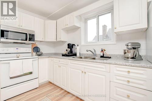 63 Centre St, Trent Hills, ON - Indoor Photo Showing Kitchen With Double Sink