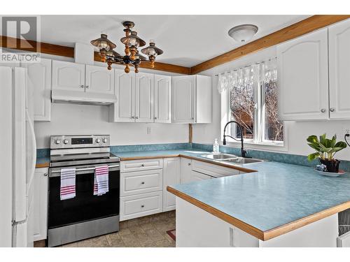 412 Sumac Road, Tappen, BC - Indoor Photo Showing Kitchen With Double Sink