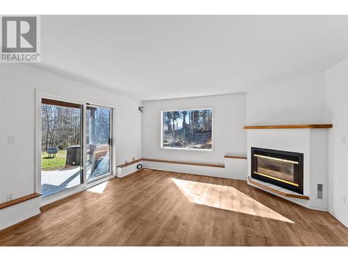 412 Sumac Road, Tappen, BC - Indoor Photo Showing Living Room With Fireplace