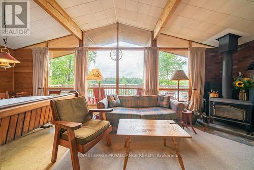 #A&B -1050 Corbett Lane, North Frontenac, ON - Indoor Photo Showing Living Room With Fireplace