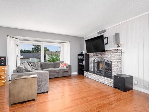 1202 43 Avenue, Vernon, BC - Indoor Photo Showing Living Room With Fireplace