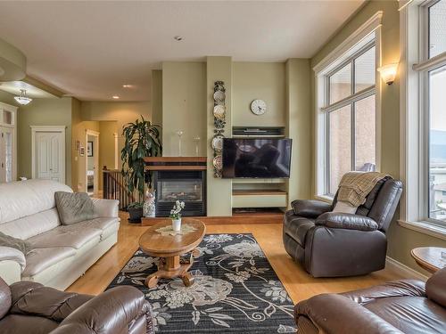 664 Mt York Drive, Coldstream, BC - Indoor Photo Showing Living Room With Fireplace
