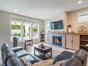 770 West Ridge Way, Qualicum Beach, BC  - Indoor Photo Showing Living Room With Fireplace 